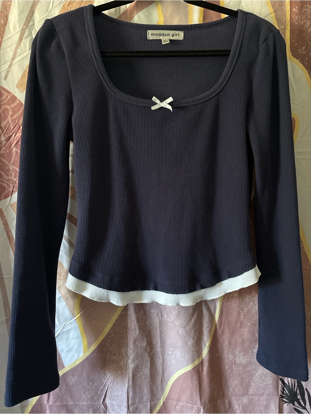 Madden Girl navy long sleeve ribbed scoop top with white bow & hem